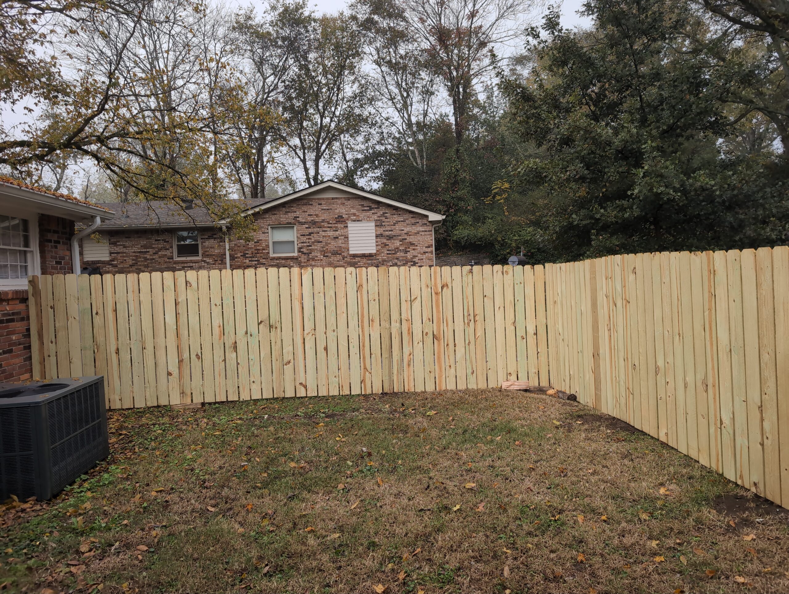 This image shows a privacy fence installed by PHI.