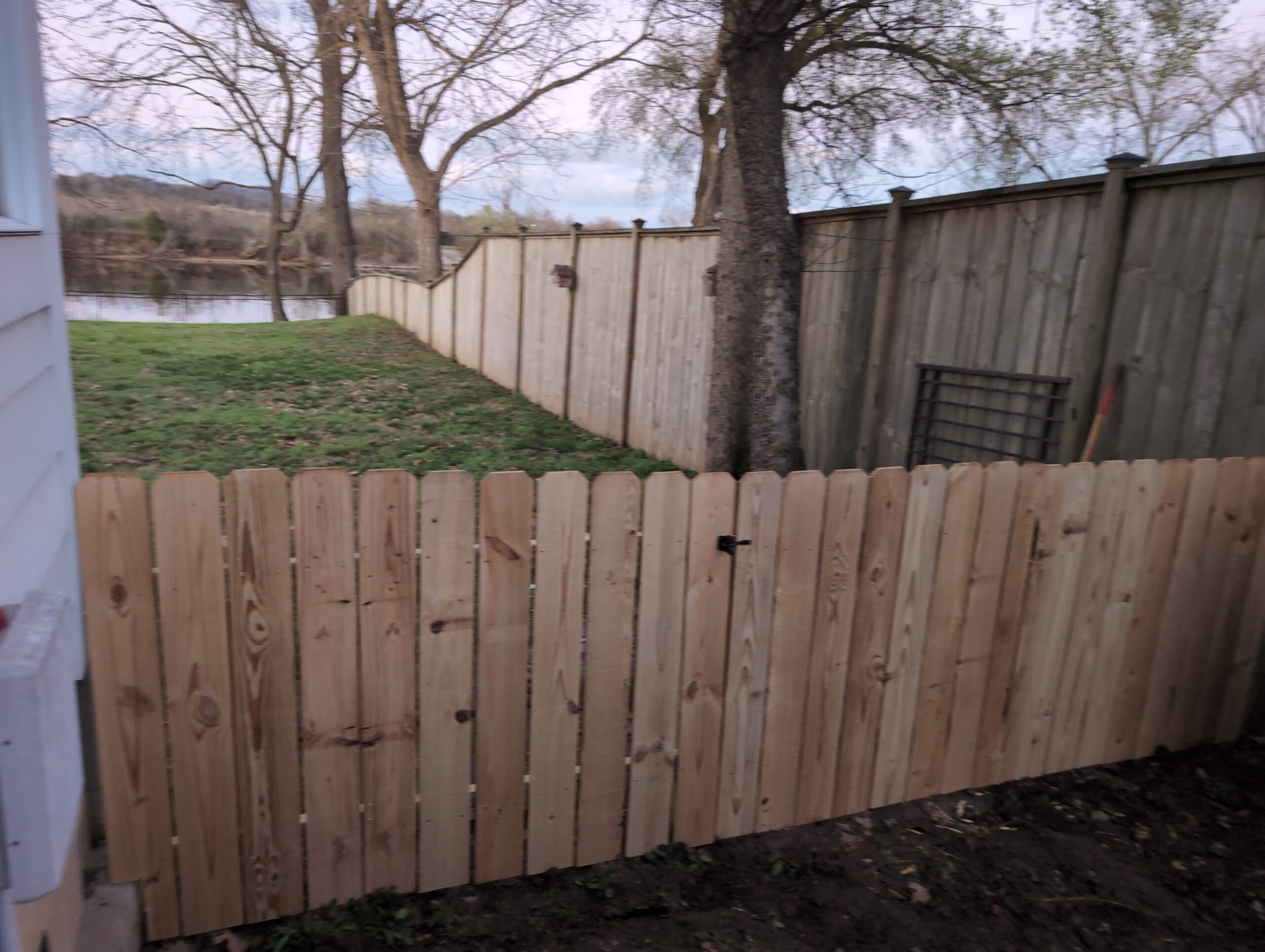 This picture shows another angle of a privacy fence built by PHI.